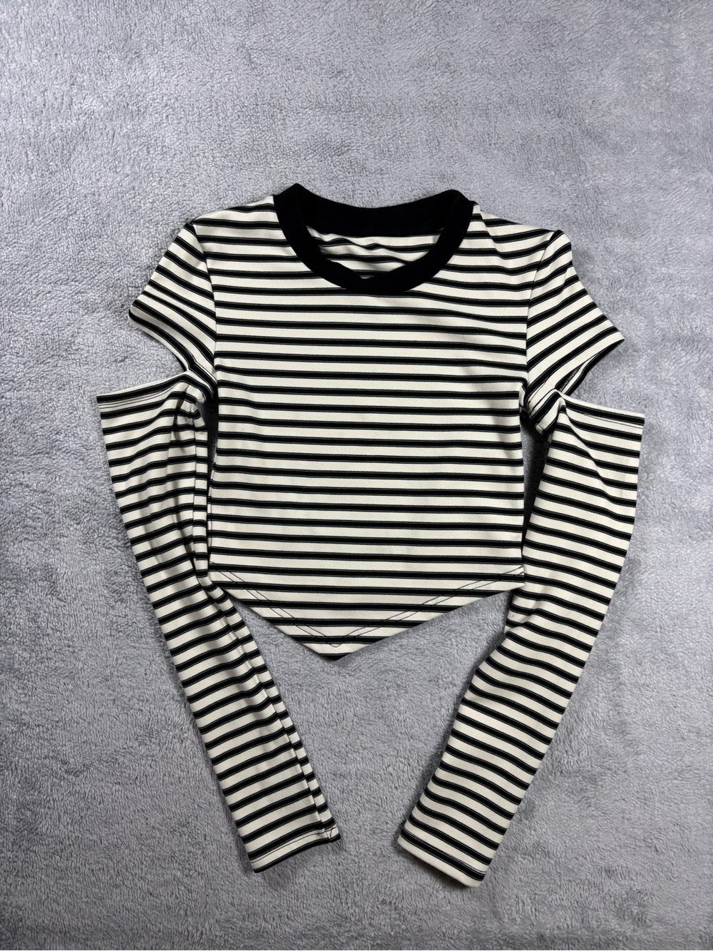 Y2K style stripped long sleeve tee with missing upper forearm section